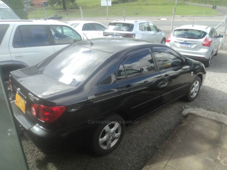 TOYOTA - COROLLA - 2004/2005 - Preta - R$ 38.000,00